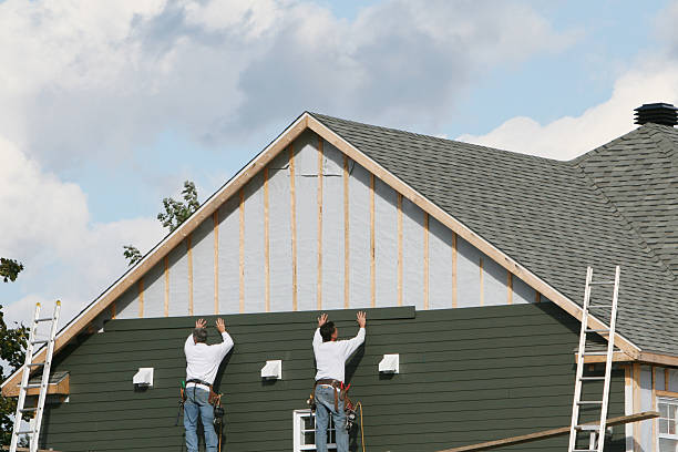 Professional Storm Damage Siding Repair technician working in Frostburg, MD